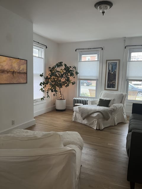 Living room w/ Samsung portrait smart TV