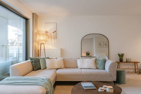 Inviting and elegant living area with direct access to terrace and open kitchen