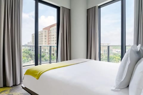 Bask in panoramic corner windows for a calm, airy escape.