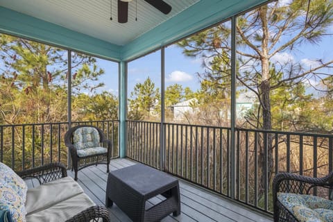 Screened Porch - A screened porch is provided and offers a relaxing space for you to enjoy outdoors without having to battle the elements.