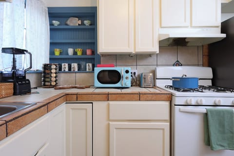 Fully equipped kitchen—pots, pans, and all.