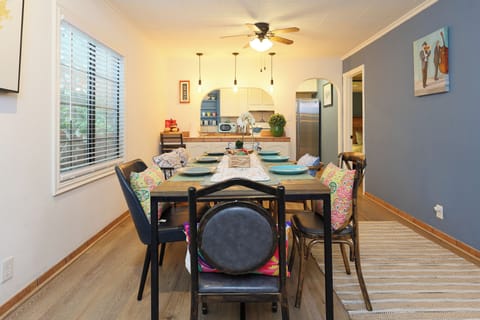 This 6-seater dining area flows into the kitchen for a stylish, cozy space.