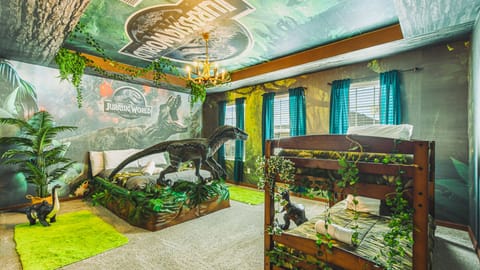 Bedroom 7 Upstairs  Full bed + two Twin bunk beds Ensuite Bathroom Walk in Shower Sleeps 6 Jurassic Park Theme