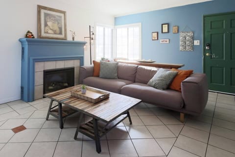 Living room area w/ 60 inch Smart TV