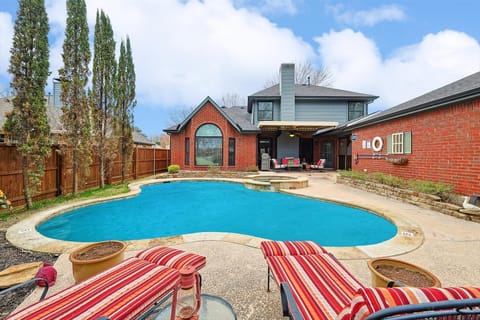 Full of charm and thoughtful features, this Flower Mound home is the perfect vacation home for an exciting getaway with excellent features both inside and out!