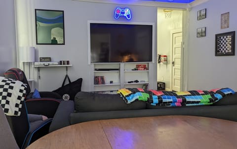 Living room. Tv preloaded with hundreds of games! 