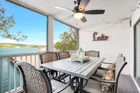 A beautiful dining balcony with amazing views -- our tranquil lakefront retreat.