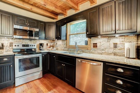 Fully equipped kitchen with coffee bar.