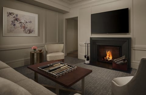 Unwind by the glowing fireplace after a city adventure.
