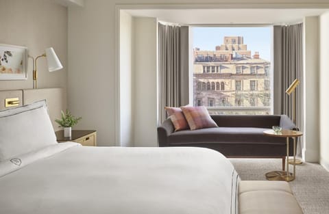 Wake up to skyline light from your cozy window sofa.