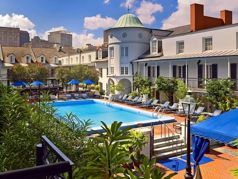 Dive into sunshine and unwind beside the sparkling courtyard pool