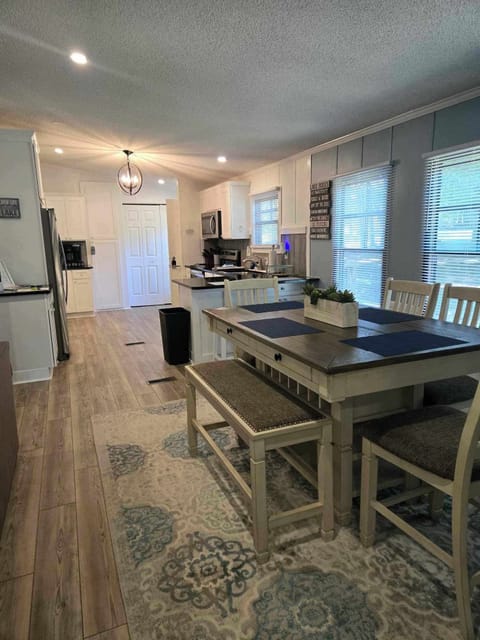 Dining room table seats six.