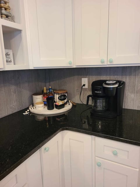 coffee bar stocked with coffee and tea