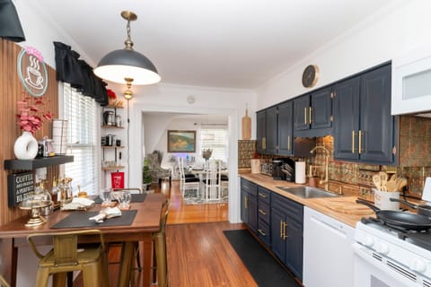 Eat-in kitchen opens to dining room. 