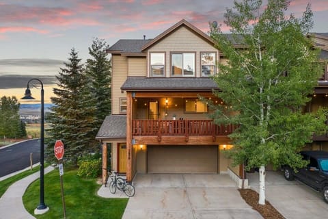 Exterior: Relax on the spacious balcony while enjoying stunning mountain views at sunset!