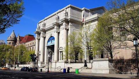 Arrive in style to a grand, sunlit landmark façade downtown.