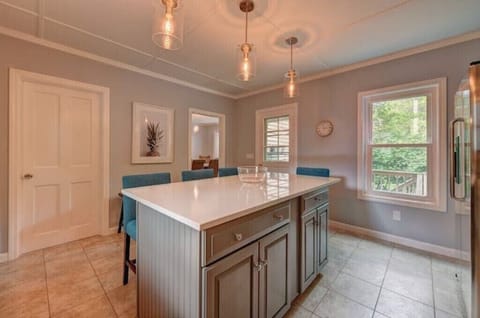 Well-appointed kitchen with an oversized island that seats four people.