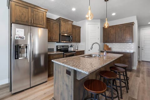 Kitchen stocked with appliances and cooking supplies