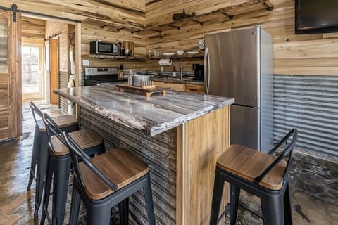 Simple, but elegant kitchen. Fully stocked