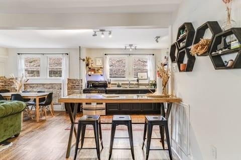 Barstool seating near the kitchen.