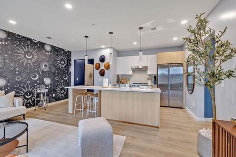 Beautiful open concept living, dining, and cooking spaces