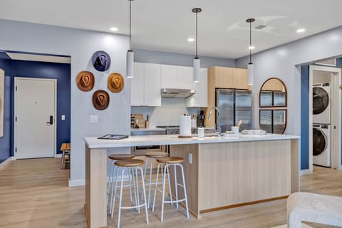 Kitchen and breakfast bar, view of entryway
