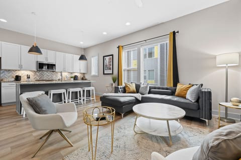 Relax in style in our modern living room with a touch of southern charm. ️