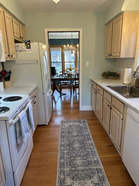 View from back door, kitchen into dining room.