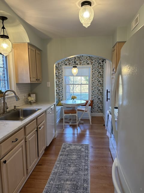 View from dining room into kitchen and breakfast nook.