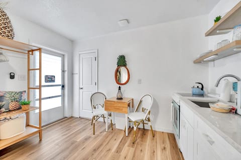 Light-filled kitchenette & dining area designed for simple meals & slow mornings.
