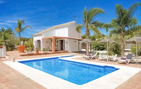 The villa and pool area