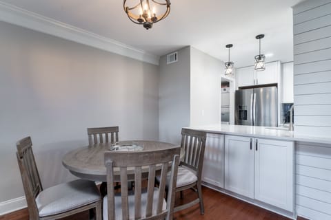 The dining table seats four