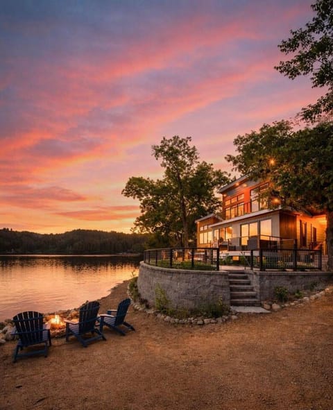 Our home sits just steps from the shoreline, allowing your group to move effortlessly between the beach, patios, hot tub, indoor comforts, & waterfront adventures.