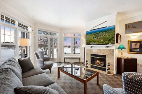 Relax in cozy comfort with an indoor fireplace and sleeper sofa for additional guests. Enjoy views of the grounds and outdoor seating on your own private deck/patio. 