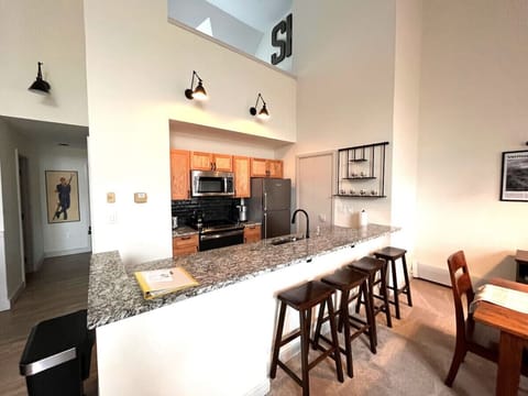 Fully equipped Kitchen with kitchen counter. Seats-4