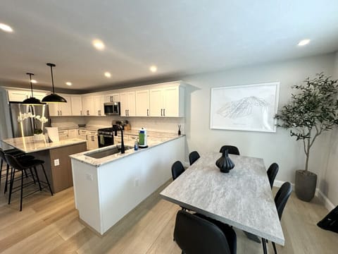 Dining and Kitchen area. Open to living room