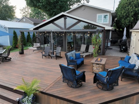 Sitting area on deck with propane fire table