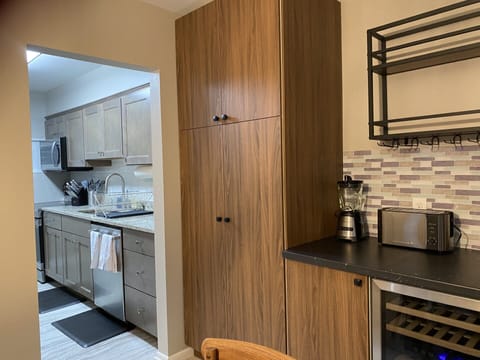 Enjoy the bar with cooler and additional storage space!