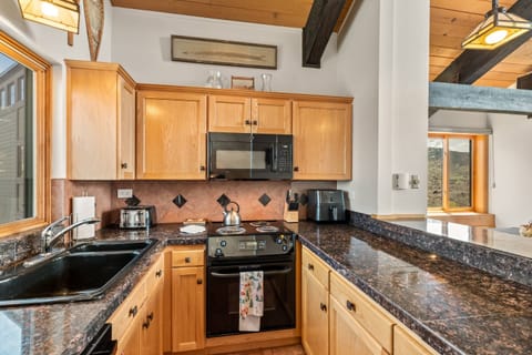 Bright and airy kitchen with plenty of counter space.
