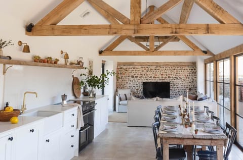 Large kitchen/living/dining space with plenty of room for everyone to cook, eat and relax together. 