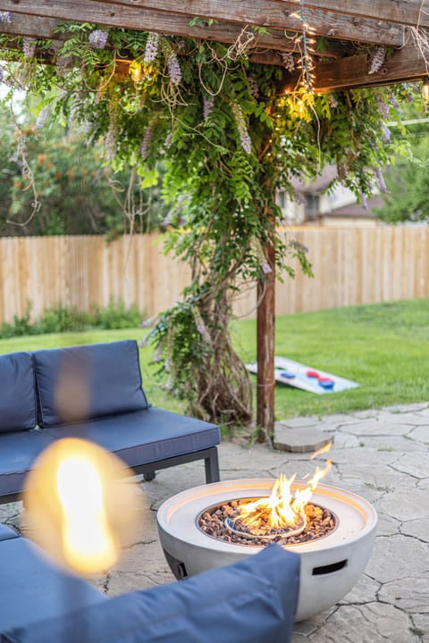 Sit back and soak in the natural beauty of the backyard patio.