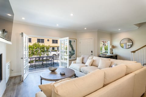 Unwind in style with our chic lounge area that opens into the spacious patio.