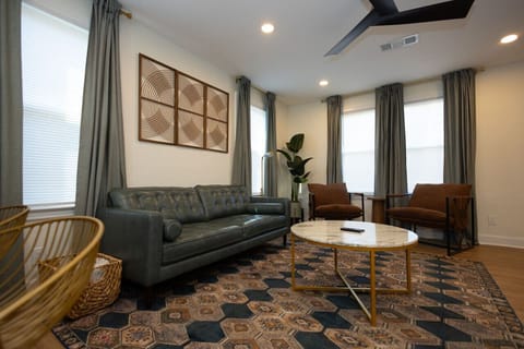 Embrace comfort and style in our large open living room, where there is ample space to unwind and entertain.