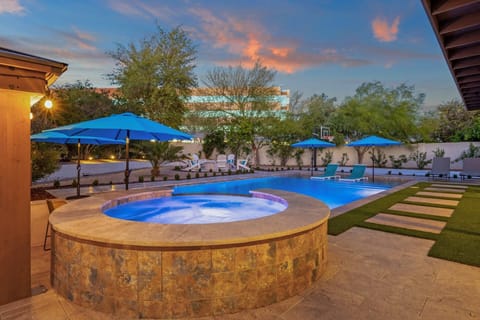 Saltwater pool with Baja shelf & swim up bar seating plus a hot tub!