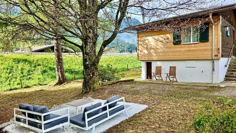 Charming Rougemont chalet with a serene alpine yard