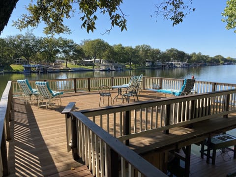 Enjoy relaxing breezes on our boat house deck right on the lake