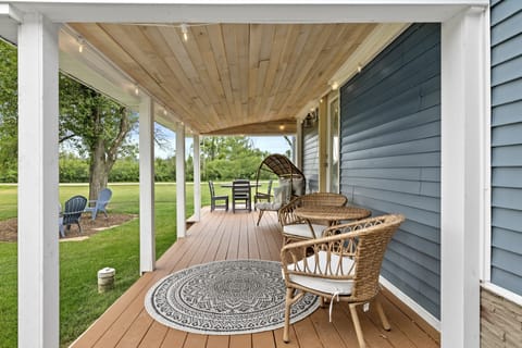 Enjoy our covered patio- the perfect place to catch a sunrise with a coffee! 