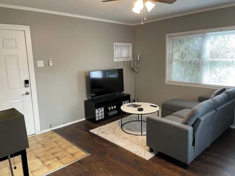 Relax and unwind in the living area with smart TV and seating.