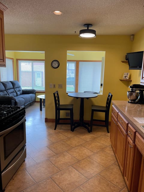 Kitchen facing sun room.