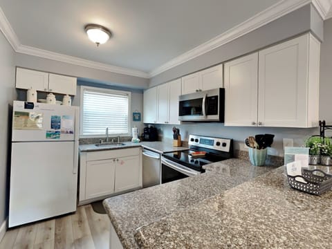 Fully Equipped Kitchen with Bar Seating for Two